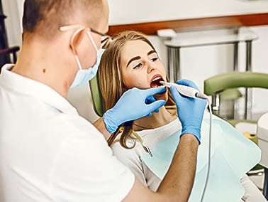 woman receiving a dental procedure