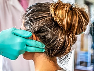 woman receiving a consultation for a smile makeover