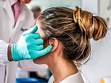 woman receiving dental consultation