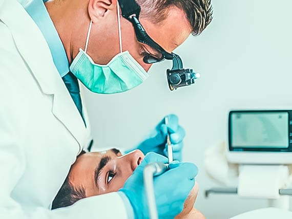 dentist performing a dental procedure